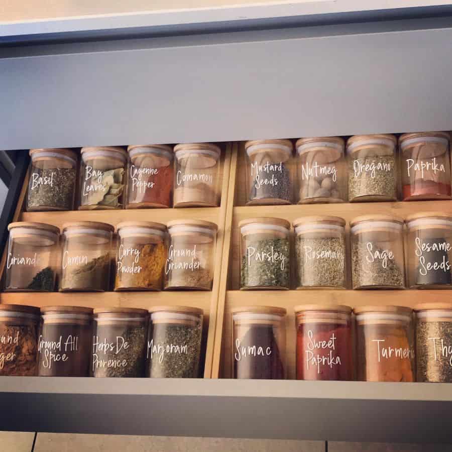 glass jars holding spices kitchen