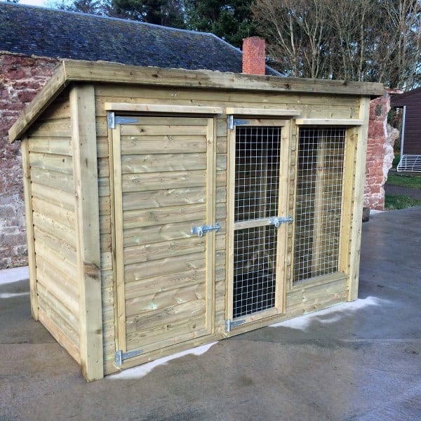 A sturdy wooden dog house with double doors and wire mesh panels, designed as a kennel for outdoor use