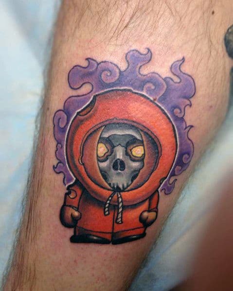 Dark-themed Kenny tattoo from South Park, featuring a skull face and glowing eyes with purple smoke for a haunting, supernatural effect.