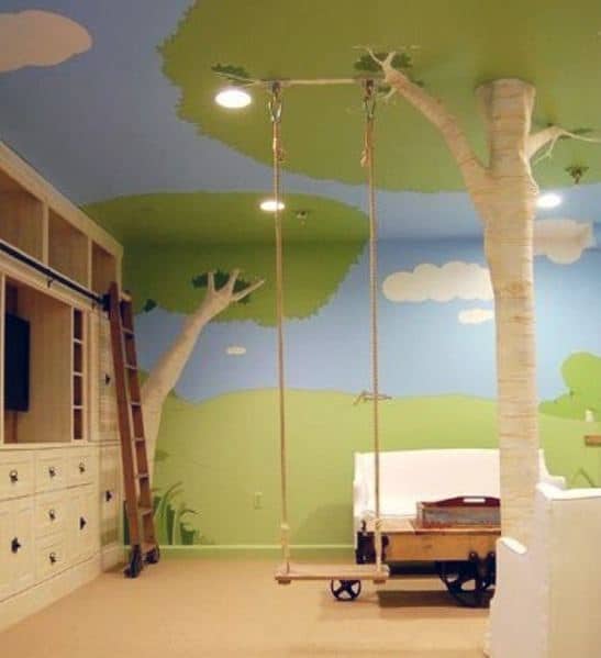 Kids' room with tree-themed basement column, swing, and playful mural walls.