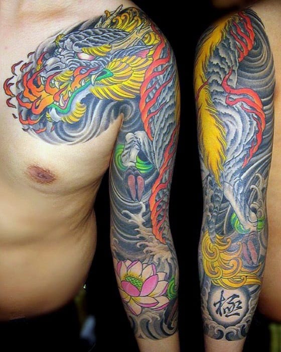 Vibrant full-sleeve Kirin tattoo with fiery red, yellow, and grey tones, swirling clouds, lotus flower, and bold traditional Japanese style.