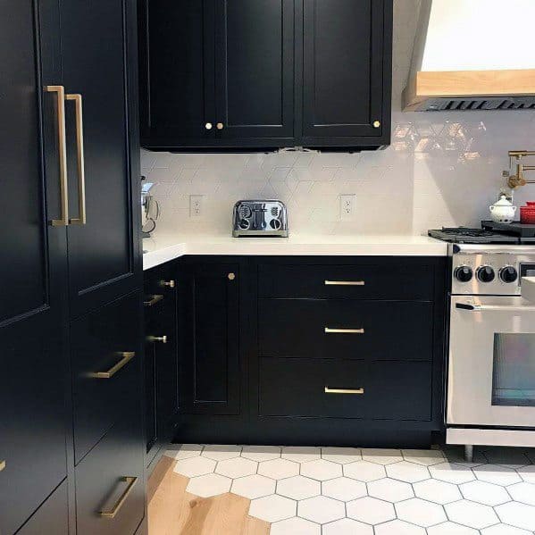 black cabinet and gold hardware 