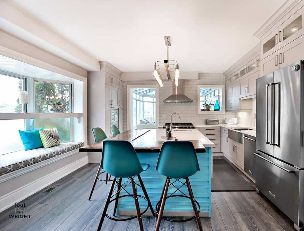 country style kitchen blue skirting island bench seating floorboards