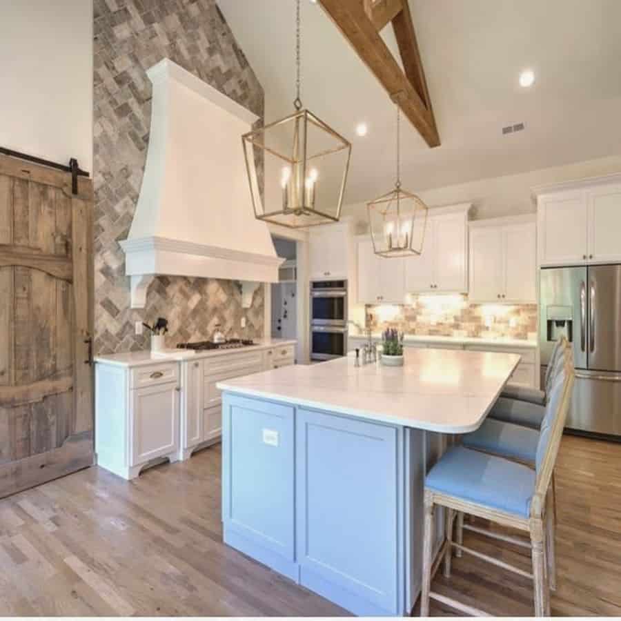 white kitchen hood french country kitchen large island bench gray tile splashback 
