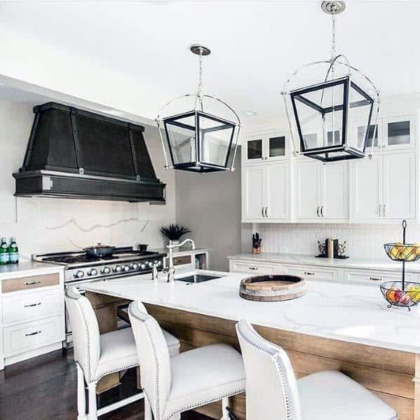 large white cabinet kitchen with black matte finish hood