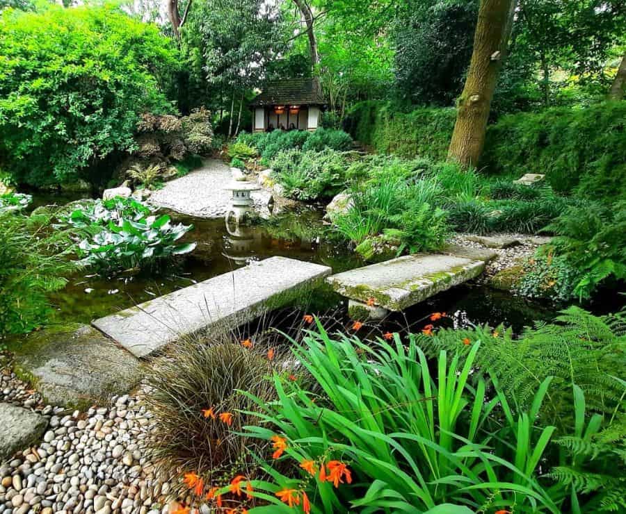 japanese garden with koi pond stone bridge 