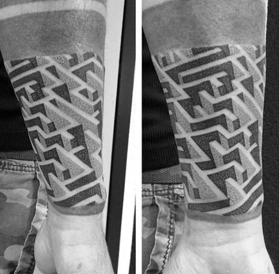 Geometric blackwork labyrinth tattoo on a man's wrist, featuring a bold 3D maze pattern with intricate shading and dotwork details.