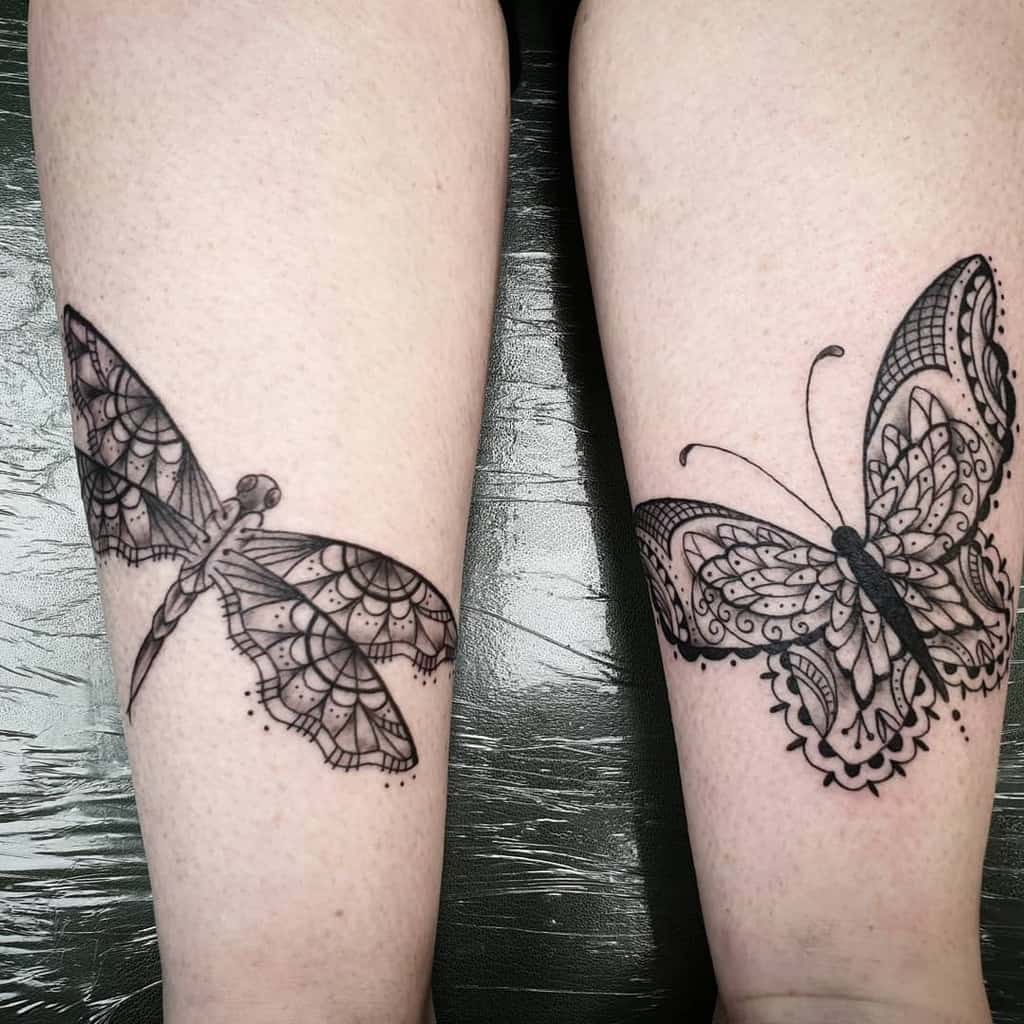Matching forearm tattoos featuring a dragonfly and a butterfly with intricate lace and mandala-style wing patterns.