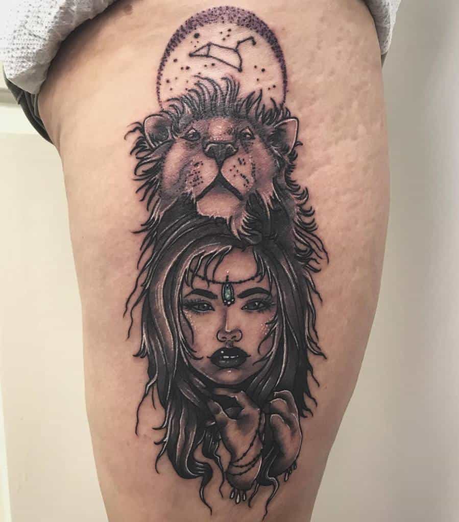 Thigh tattoo of a lion spirit guide over a mystical woman, with the Leo constellation glowing in the background.