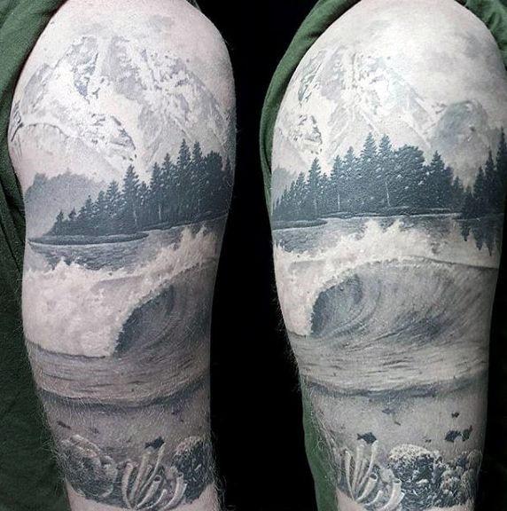 Nature-themed arm tattoo blending mountain peaks, dense pine forest, crashing waves, and underwater coral in a surreal black and grey style.