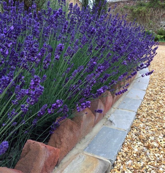 Landscaping Red Brick With Grey Stone Gravel Driveway Ideas