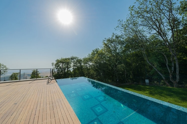 large above ground infinity pool deck