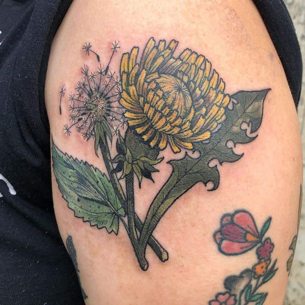 This tattoo blends the boldness of a yellow flower with the delicate softness of dandelion seeds, symbolizing a balance of strength and fragility.