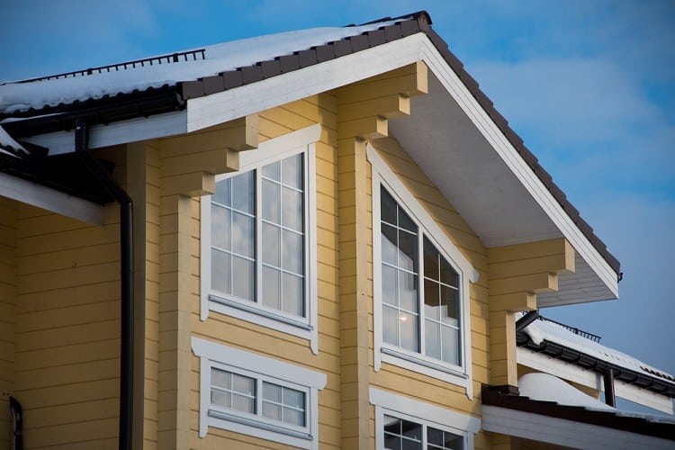large window with modern trim yellow walls
