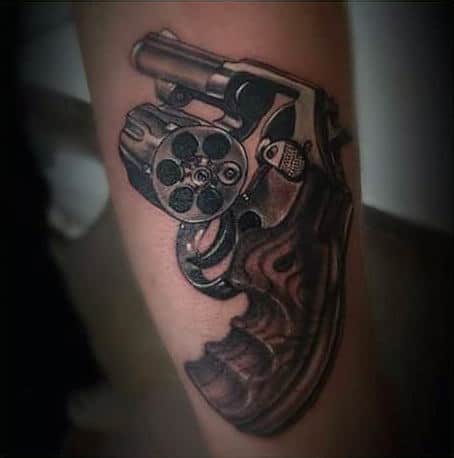 Last Bullet Remaining Pistol Tattoo On Elbows For Guys