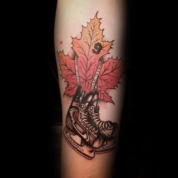 Leaf With Hockey Ice Skates Mens Inner Forearm Tattoo