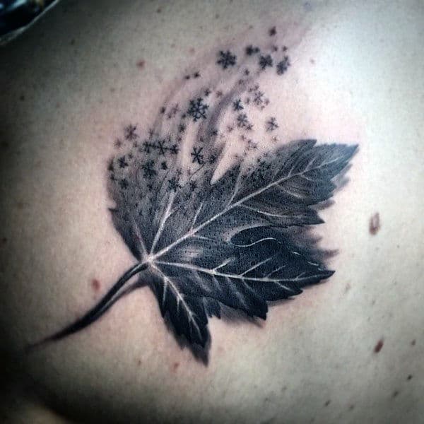 Leaf With Snowflakes Guys Back Tattoo