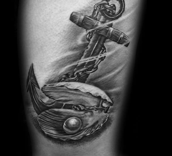 Black and grey tattoo of an anchor embedded in a clam shell with a pearl, blending nautical and marine themes with dramatic shading.
