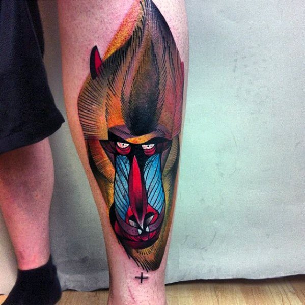 Modern baboon tattoo with bold geometric shapes, vivid colors, and sharp details, creating a striking and artistic leg design.