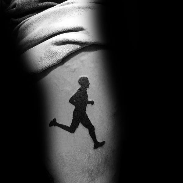 Silhouette tattoo of a running man in motion, capturing the spirit, discipline, and passion of a dedicated marathon runner.