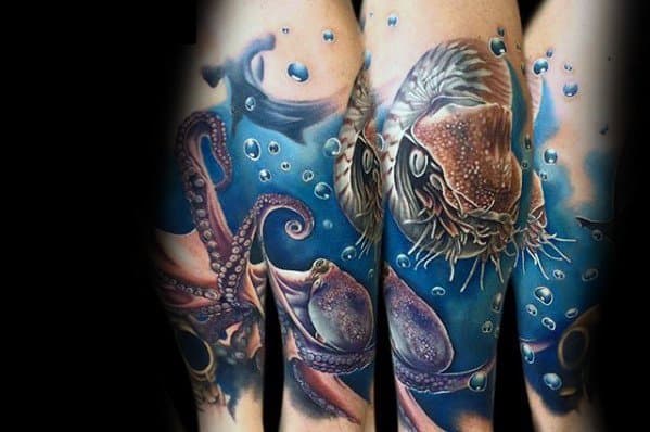 Tattoo of an octopus and fish swimming through vibrant underwater scenery, with bubbles rising to the surface, creating a dynamic and fluid oceanic design.