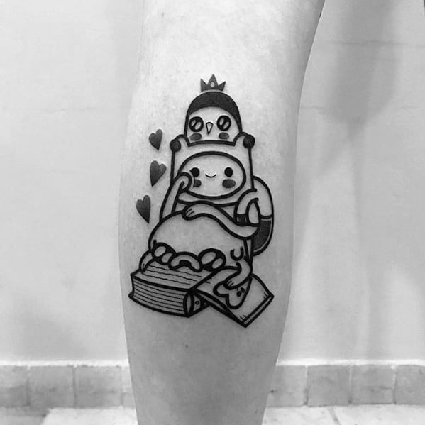 Minimalist black ink Adventure Time tattoo of Finn and Princess Bubblegum cuddling on a book with floating hearts, placed on the leg.