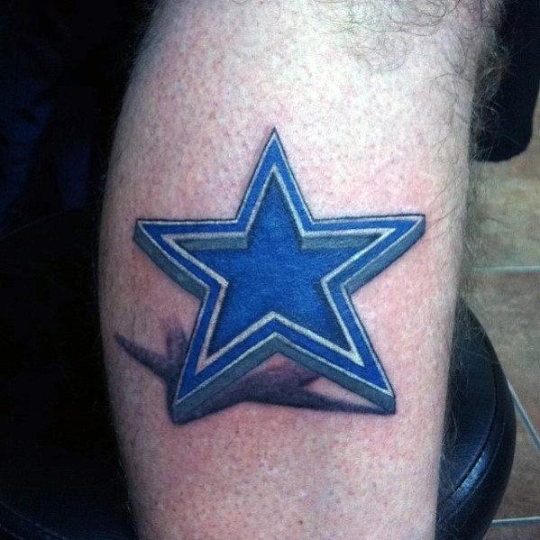 3D blue star tattoo with bold outlines and a shadow underneath, creating a lifted and dimensional effect on the lower leg.