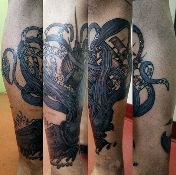 Leg Calf Blue Squid Swallowing Sailboat Tattoo On Man