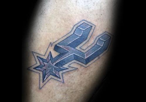 3D-style San Antonio Spurs logo tattoo with black and grey shading, giving it a bold, raised appearance against the skin.