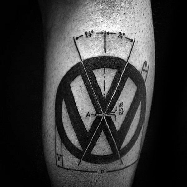 Black Volkswagen logo tattoo on the leg with geometric measurements and diagram-style lines for a technical, blueprint-inspired look.