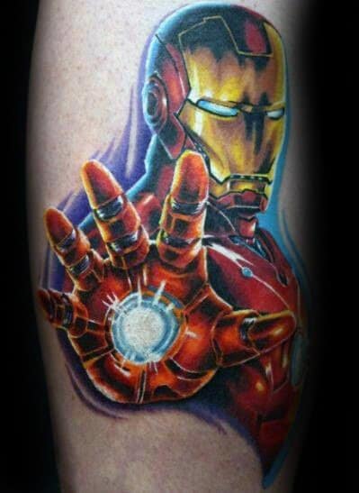 Iron Man tattoo showcasing a powerful action pose with his hand extended, ready to unleash a repulsor blast, featuring vibrant colors and detailed armor design.
