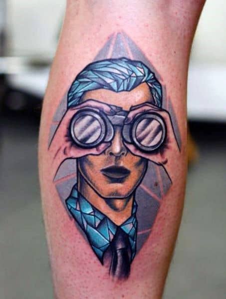 Futuristic tattoo of a man with geometric blue features holding binoculars, blending surrealism and modern artistry in a bold design.
