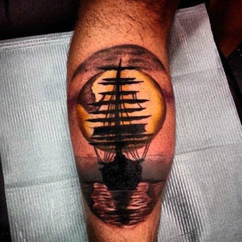 Leg Calf Sailboat Sunset At Sea Tattoo For Guys