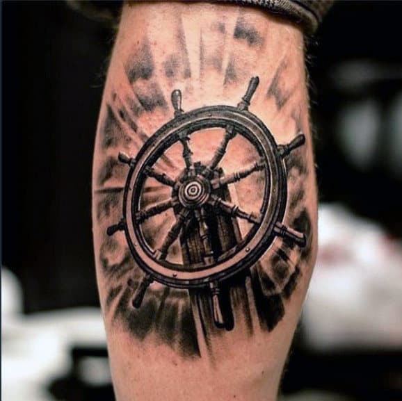 Leg Calf Ship Wheel Tattoo Design For Guys