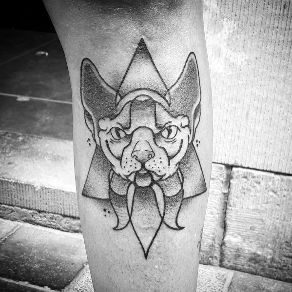 Geometric blackwork cat tattoo with bold lines, shading, and an abstract triangular design for a modern and striking look.