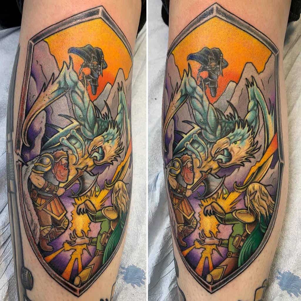 Colorful shield-like tattoo depicting a D&D battle scene with characters fighting a dragon