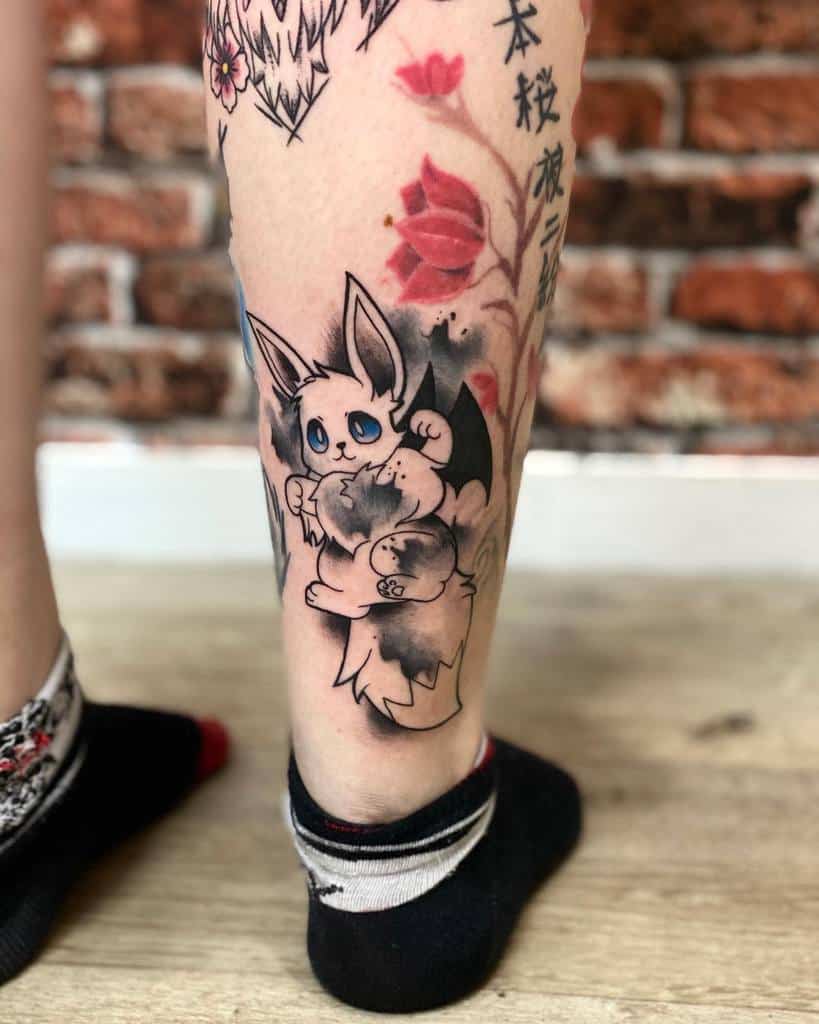 Creative Eevee tattoo with a smoky black background and bold outlines, blending playful charm with artistic flair