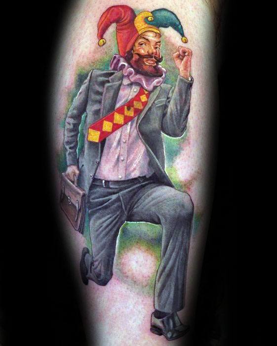 A colorful tattoo of a jester dressed in a business suit, running with a briefcase, blending formal and playful elements in a vibrant, cartoonish style.
