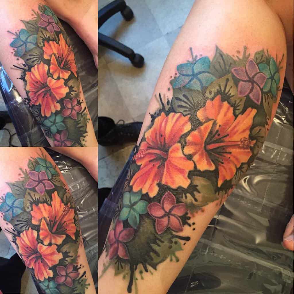 Leg hawaiian flower tattoo