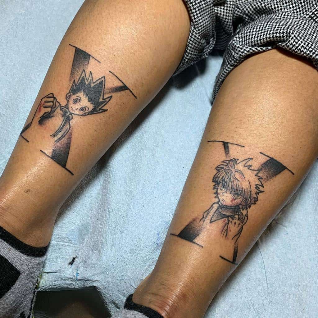 Black and gray tattoos of Gon and Killua from Hunter X Hunter, framed within angled lines, on a person's legs
