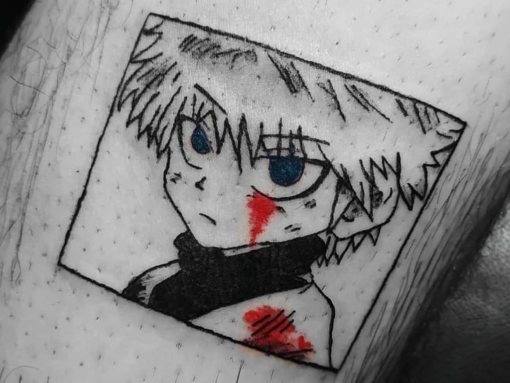 Black and white tattoo of Killua from Hunter X Hunter, with a red mark across his face, in a comic-style frame