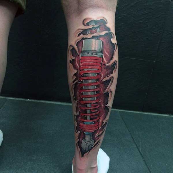 Leg Mechanical Shock Skin Ripping Open Tattoo On Man