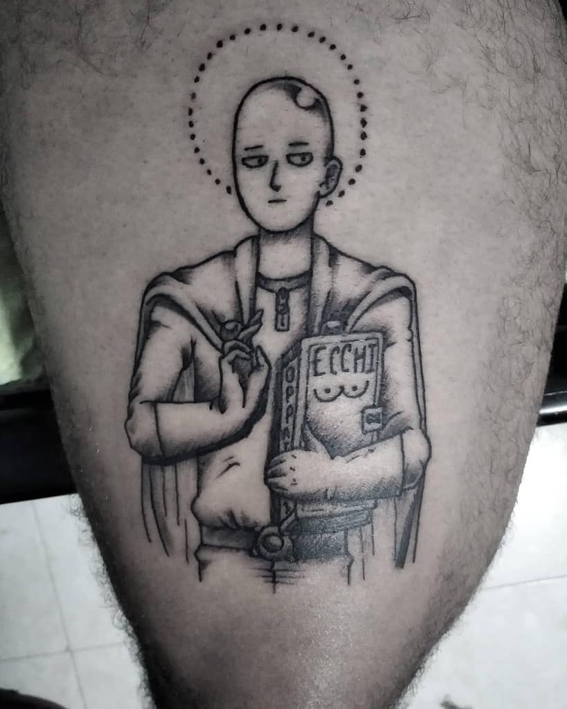 A humorous black and gray tattoo of Saitama from One Punch Man depicted as a saint, holding an "Ecchi" book and making a blessing gesture