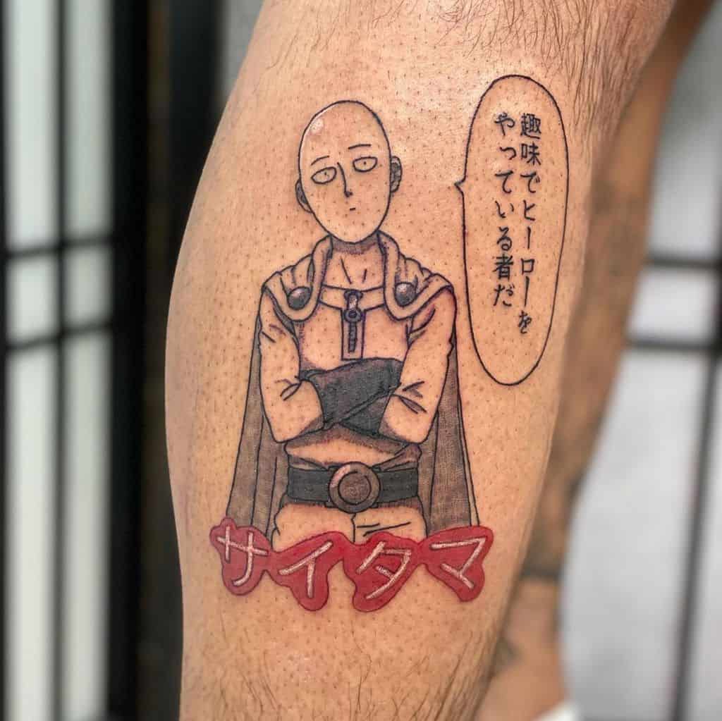 A tattoo of Saitama from One Punch Man with his signature blank expression, featuring Japanese text and his name in bold red lettering