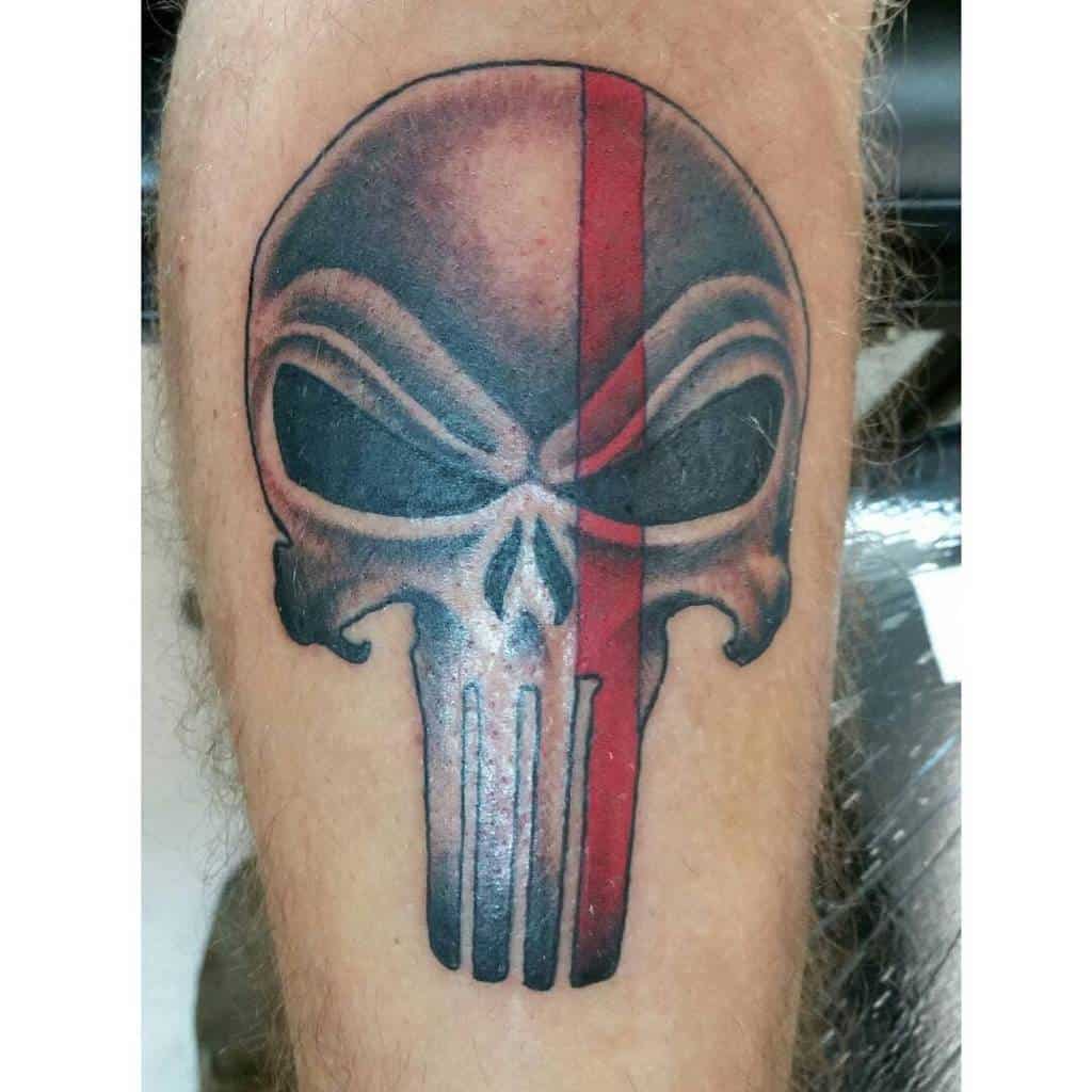 Punisher Skull tattoo with vertical red stripe splitting the design in half