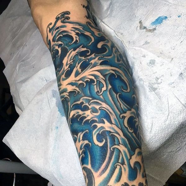 leg-sleeve-blue-ink-japanese-wave-guys-tattoo-ideas