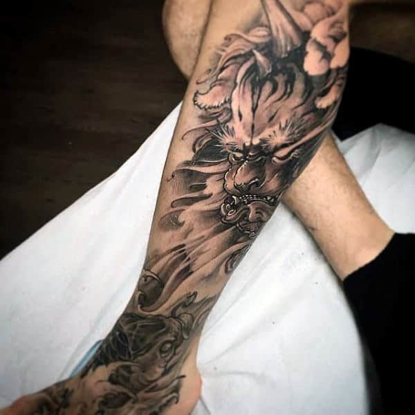 Leg Sleeve Koi Fish Tattoo On Man