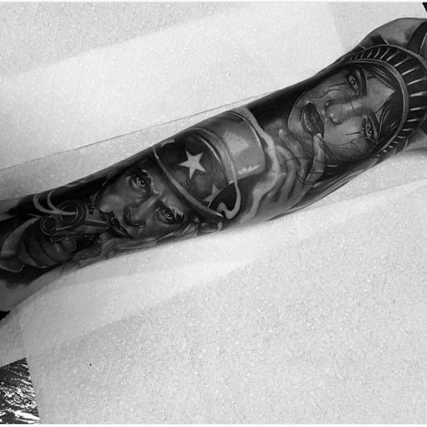 Full sleeve tattoo in black and gray featuring a realistic Uncle Sam pointing and the Statue of Liberty with a solemn expression.