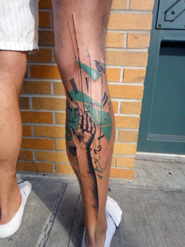 Leg tattoo featuring abstract design, hand, butterfly, and geometric shapes