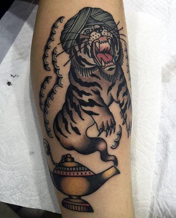 Tattoo of a roaring tiger emerging from a magical genie lamp on skin
